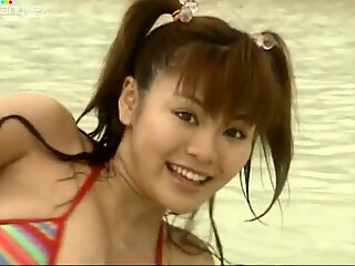 Very busty Japanese chick Yoko Matsugane teases with her juggs